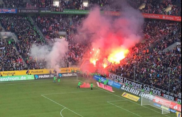 VIDEO Incidente la derby-ul Borussia Monchengladbach - FC Koln! Fanii au intrat pe teren şi s-au bătut cu forţele de ordine