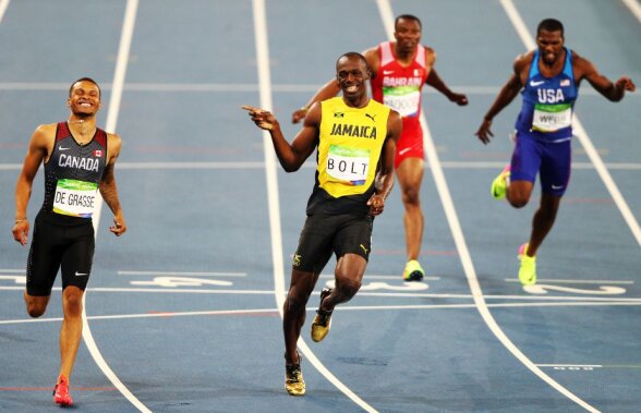 FOTO Moment genial oferit de Bolt în semifinala la 200 de metri » Jamaicanul a terminat cursa certându-și adversarul: "Ce naiba faci?"