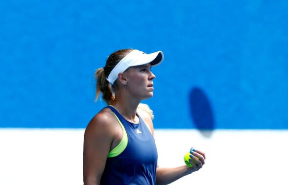 SIMONA HALEP - CAROLINE WOZNIACKI / VIDEO + FOTO Prima luptă e câștigată de Wozniacki » Ce se întâmplă ACUM pe Rod Laver