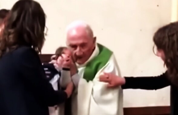 VIDEO Imagini scandaloase! Un preot a lovit un copil la botez