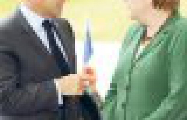 Salvarea zonei euro, la mana liderilor Frantei si Germaniei