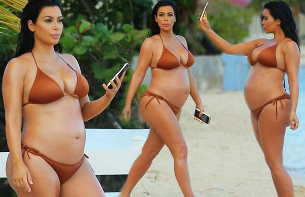 Kim Kardashian, mîndră de corpul ei! Imagini incendiare în costum de baie