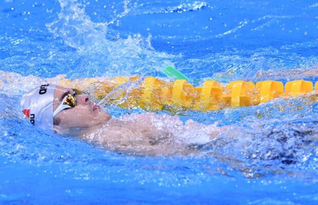 Corespondență de la Rio / Puștiul care a fluierat în biserică. Într-o noapte cu trei recorduri mondiale, Robert Glință s-a calificat în finala de 100 m spate!
