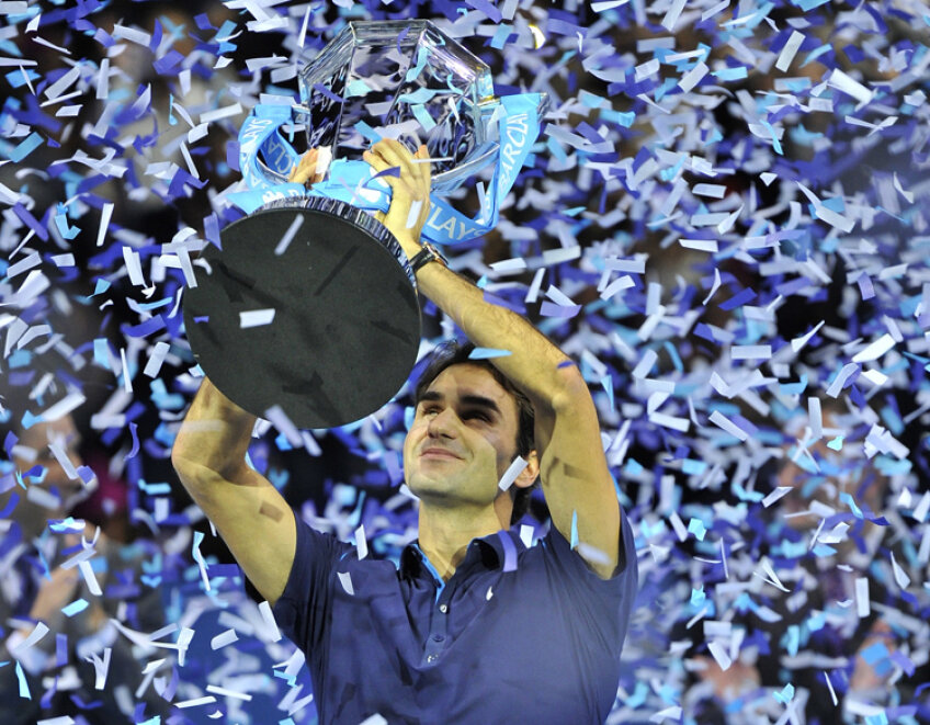 Roger Federer a primit 1,7 milioane de dolari pentru că a cucerit titlul fără înfrîngere Foto: Reuters