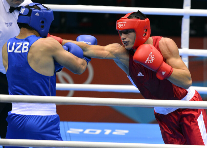 Singurul boxer român calificat la JO, Bogdan Juratoni, a fost dezavantajat de către arbitrii, fiind victimă a conflictului dintre AIBA şi Rudel Obreja