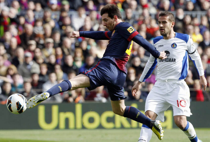 Acrobatul Messi îl lasă în admirație pe fundașul lui Getafe, Lopo Garcia // Foto: Reuters