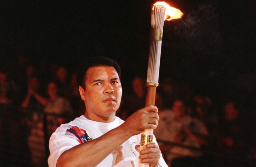 În 1996, la Atlanta, cu flacăra olimpică // Foto: Reuters