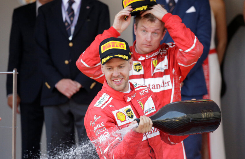 Sebastian Vettel și Kimi Raikkonen pe podium // FOTO Reuters